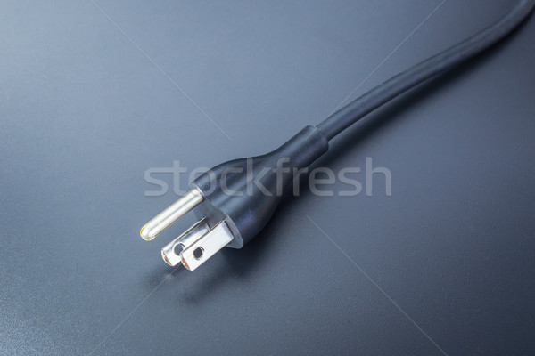electronic power plug for laptop computer on black background,cl Stock photo © FrameAngel