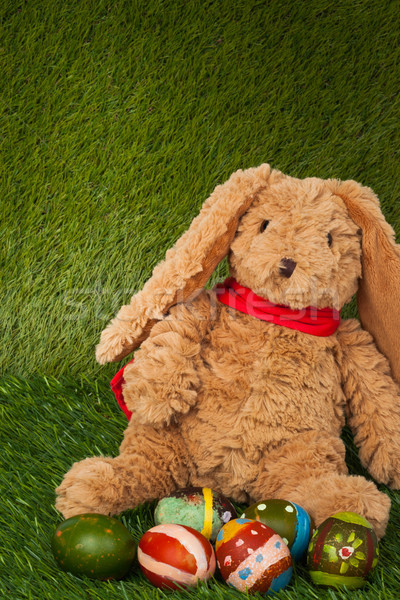 Rabbit, sit on green grass with group of colorful eggs, can use  Stock photo © FrameAngel