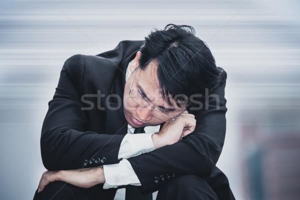 asian businessman sad worry tired and headache, stress at workpl Stock photo © FrameAngel