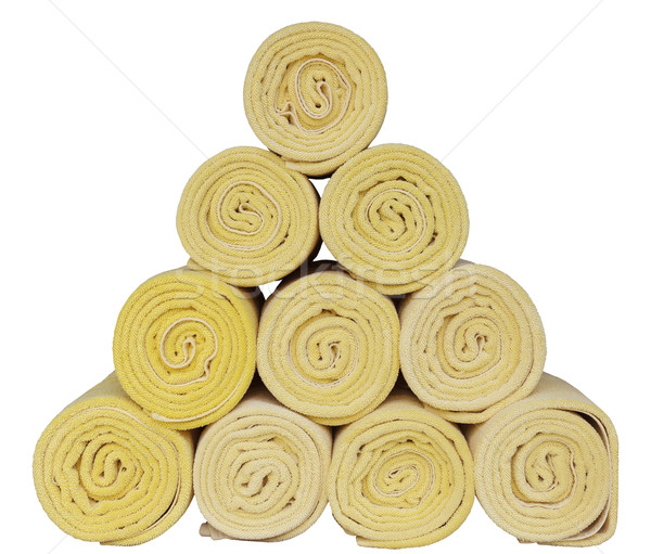 Rolled up spa towels on white Stock photo © FrameAngel