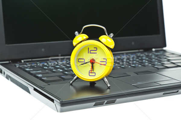 Clock on Notebook as time management concept Stock photo © FrameAngel