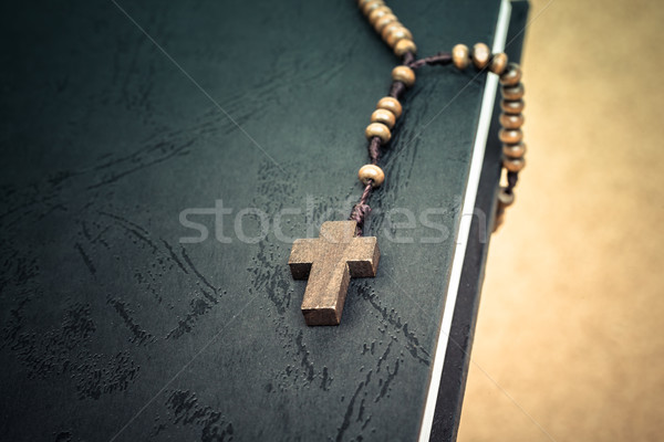 Christian cross necklace on Holy Bible book, Jesus religion conc Stock photo © FrameAngel