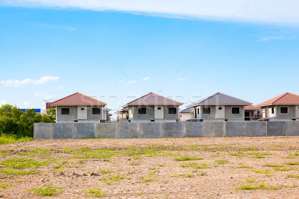 House Building and Construction Site village in progress, waitin Stock photo © FrameAngel