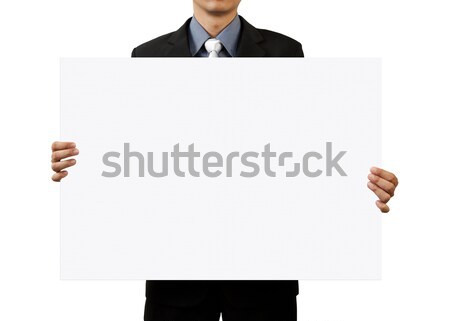 Stock photo: businessman holding blank sign and hand on white