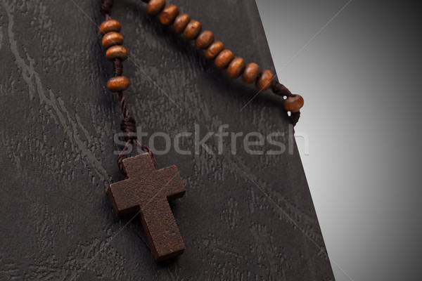 Christian cross necklace on Holy Bible book, Jesus religion conc Stock photo © FrameAngel