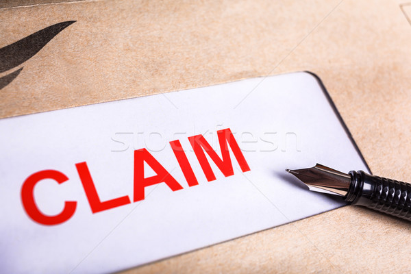 Claim form in brown envelope, can use insurance concept Stock photo © FrameAngel