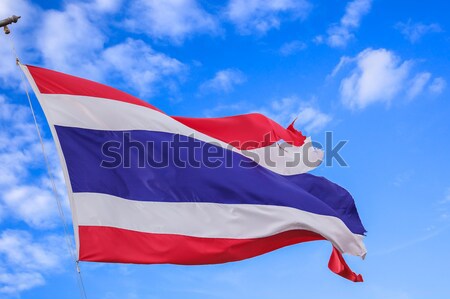 defective waving flag of Thailand and blue sky background Stock photo © FrameAngel