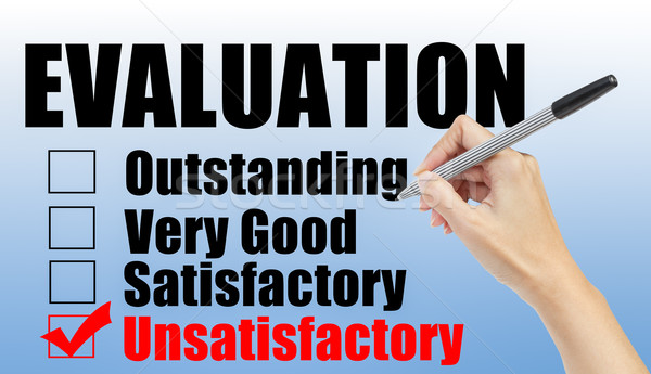 Evaluation form and hand check unsatisfactory Stock photo © FrameAngel