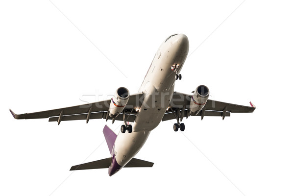 Passenger business airplane take off and flying on white backgro Stock photo © FrameAngel