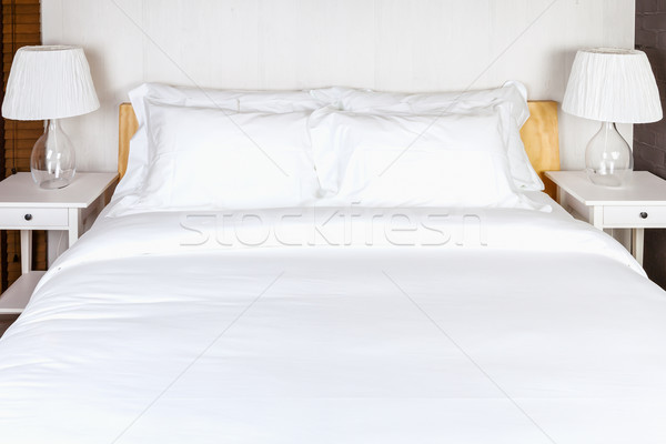 two pillow on bedroom with white bed sheet and lamp Stock photo © FrameAngel