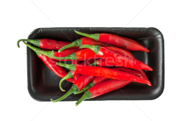 Red chili peppers  in Styrofoam Food Tray Stock photo © FrameAngel