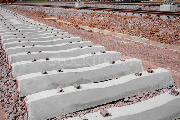 Railroad track in railway for train, construction site Stock photo © FrameAngel