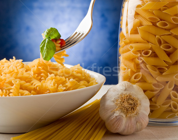 Pasta with tomato sauce on blue background Stock photo © Francesco83