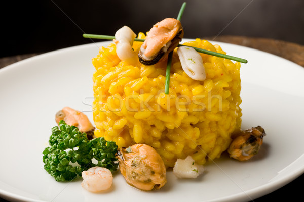 Risotto szafran owoce morza Fotografia drewniany stół Zdjęcia stock © Francesco83