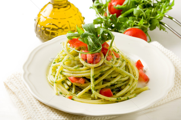 Pasta with arugula pesto and cherry tomatoes Stock photo © Francesco83