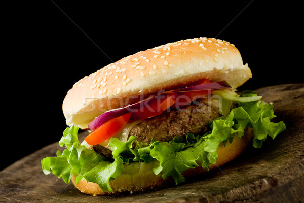 Stock foto: Hamburger · Foto · Holztisch