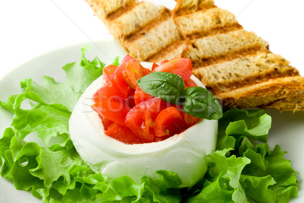 Umplut branza mozzarella roşii busuioc salată verde alb Imagine de stoc © Francesco83
