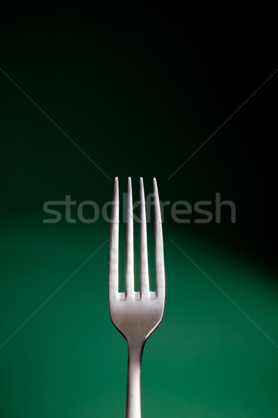 Fork over green background - Cooking concept Stock photo © Francesco83