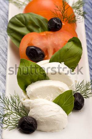 Paradicsom mozzarella saláta fotó finom fekete oliva Stock fotó © Francesco83