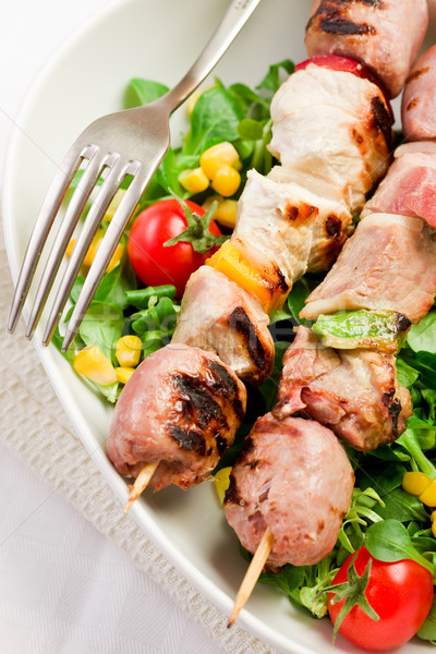 Meat Skewers on white table Stock photo © Francesco83