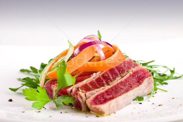 Chopped Tuna over fresh arugula salad Stock photo © Francesco83