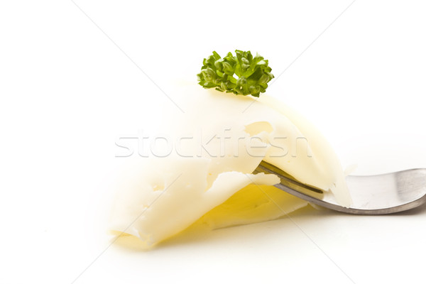 Slice of Cheese with parsley on fork Stock photo © Francesco83