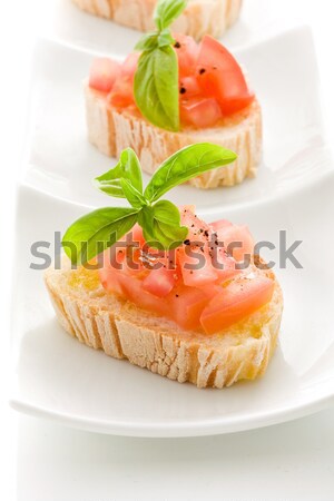 Bruschetta pomidory bazylia odizolowany Fotografia Zdjęcia stock © Francesco83