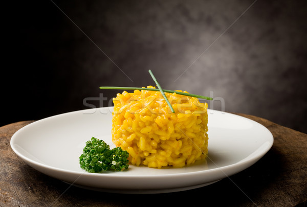 Risotto szafran Fotografia żółty drewniany stół Zdjęcia stock © Francesco83