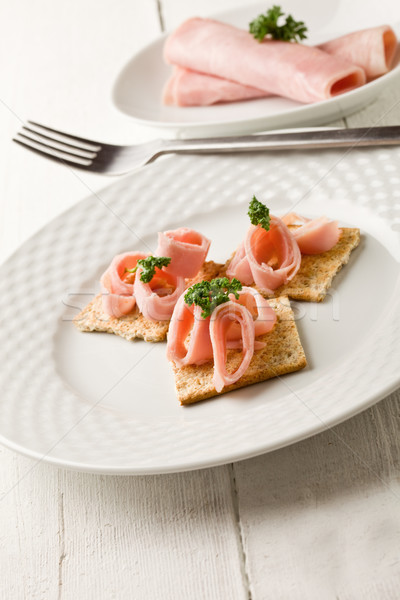 Crackers canapes with ham and parsley Stock photo © Francesco83
