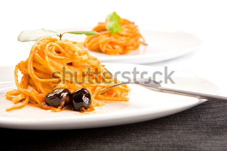 Spaghetti with olives and tomatoe sause - Pasta alla Puttanesca Stock photo © Francesco83