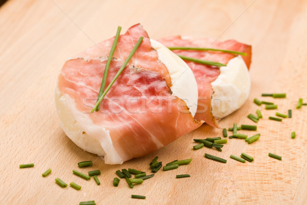 Stock photo: Cheese with wrapped bacon