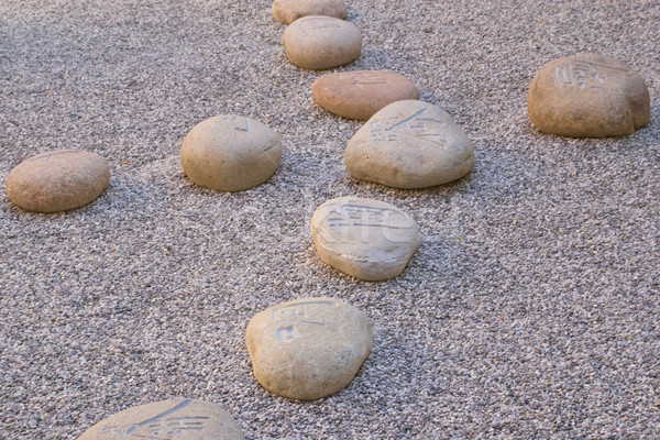Cinese forma cross ghiaia pietre Foto d'archivio © frank11
