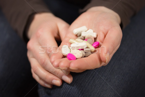 Nő kezek tabletták sötét férfi szív Stock fotó © frank11