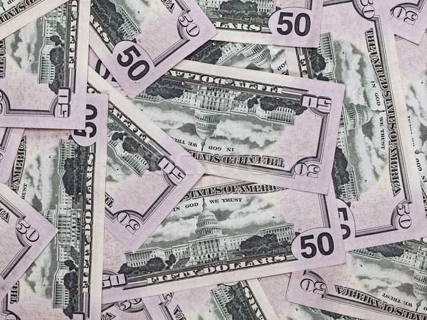 A Pile of Fifty Dollar Bills as a Money Background Stock photo © Frankljr