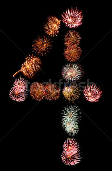 Firework Bursts Arranged in to the Number 4 Stock photo © Frankljr