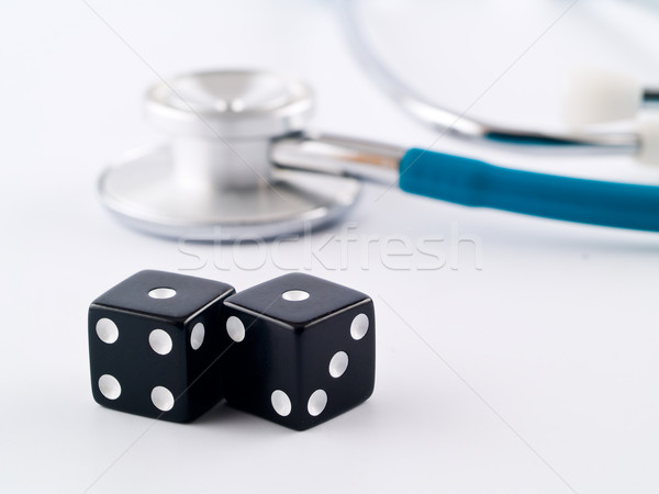 Stetoscopio dadi gioco d'azzardo faccia medici nero Foto d'archivio © Frankljr