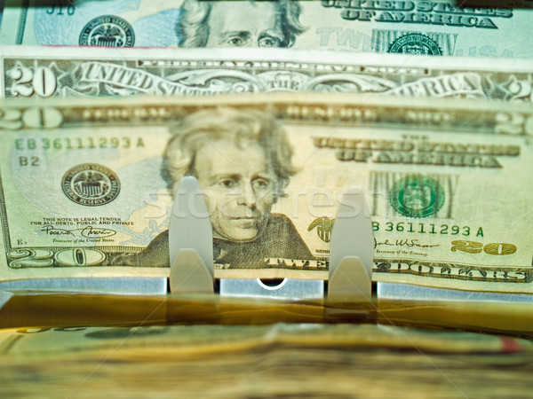 An electronic money counter processing US $20 bills Stock photo © Frankljr