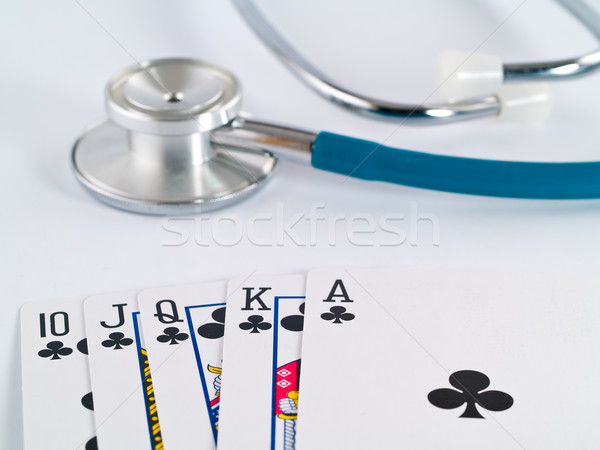 Stetoscopio carte da gioco gioco d'azzardo faccia medicina carta Foto d'archivio © Frankljr