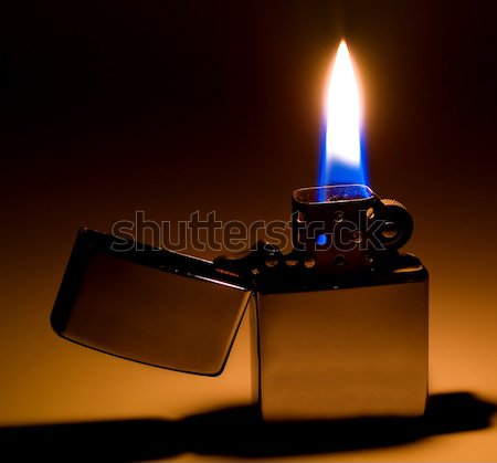 Cigarette briquet jaune bleu flamme fond [[stock_photo]] © Frankljr