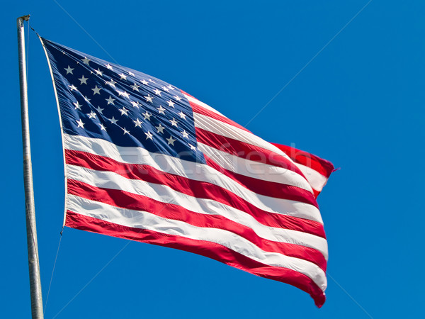 American Flag Waving Proudly on a Clear Windy Day Stock photo © Frankljr