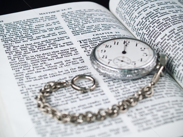 The Bible opened to Matthew 24: 36 with a Pocketwatch Stock photo © Frankljr