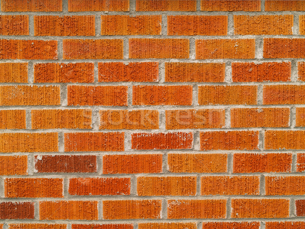Brick wall background, in good repair, in shades of red and orange. Stock photo © Frankljr