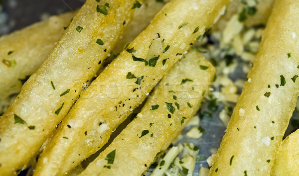 Closeup of a Serving of Seasoned French Fries Stock photo © Frankljr