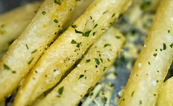 Closeup of a Serving of Seasoned French Fries Stock photo © Frankljr