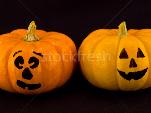 Mini Pumpkins with Funny Faces with a Black Cloth Background Stock photo © Frankljr