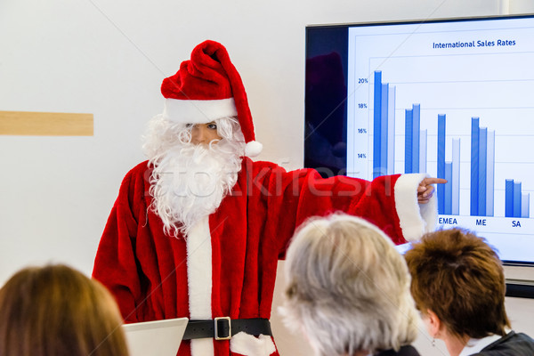 Vrouwelijke kerstman presenteren zakelijke bijeenkomst verkoop business Stockfoto © franky242