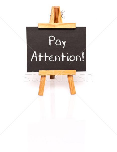 Pay attention. Blackboard with text and easel. Stock photo © franky242