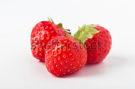 Three Strawberries Grouped Stock photo © frannyanne