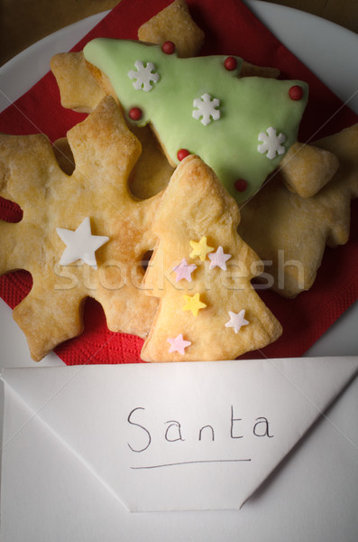 Karácsony kekszek boríték mikulás tányér alakú Stock fotó © frannyanne