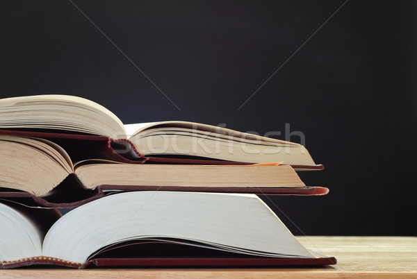 Books on Desk with Chalkboard Stock photo © frannyanne